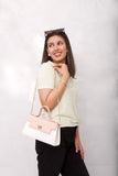 Twist lock crossbody- white with pink